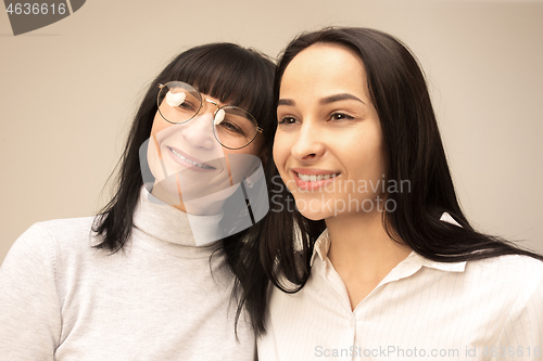 Image of A portrait of a happy mother and daughter