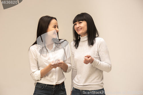 Image of A portrait of a happy mother and daughter