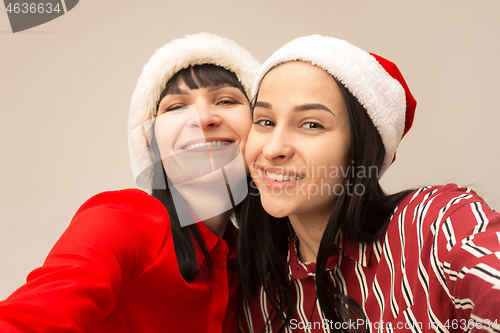 Image of A portrait of a happy mother and daughter