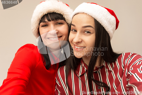 Image of A portrait of a happy mother and daughter