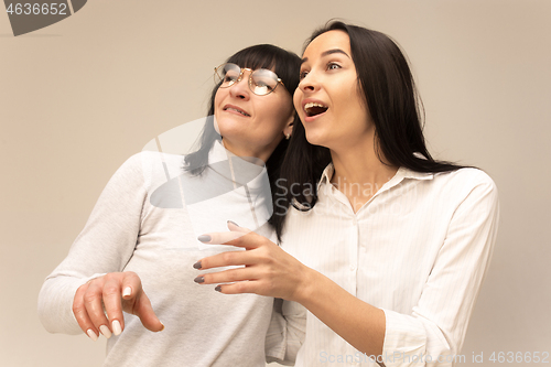 Image of A portrait of a happy mother and daughter