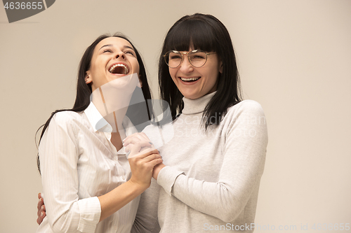 Image of A portrait of a happy mother and daughter