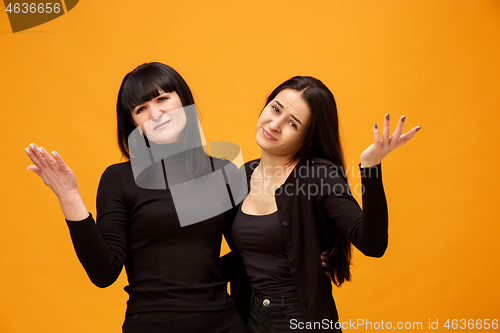 Image of A portrait of a unhappy mother and daughter