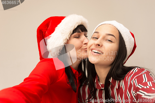 Image of A portrait of a happy mother and daughter