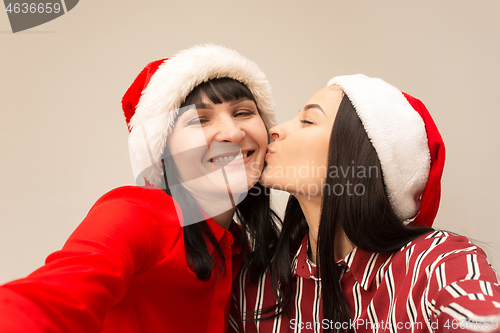 Image of A portrait of a happy mother and daughter