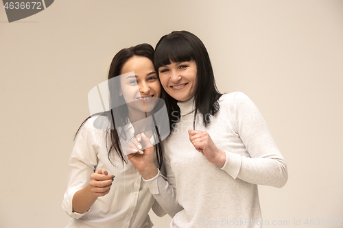 Image of A portrait of a happy mother and daughter