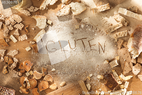 Image of Gluten free food. Various pasta, bread and snacks on wooden background from top view