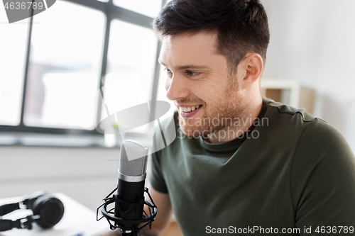 Image of close up of blogger with microphone audio blogging