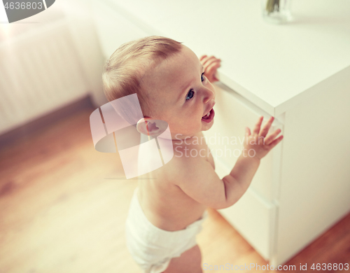 Image of close up of happy little baby boy or girl at home