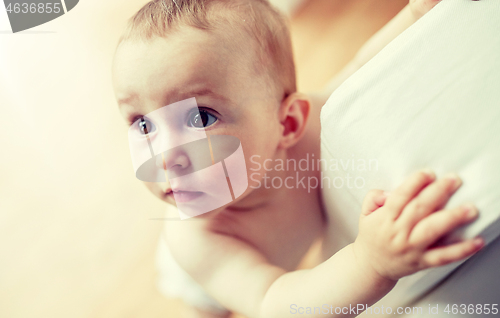 Image of close up of happy little baby boy or girl at home