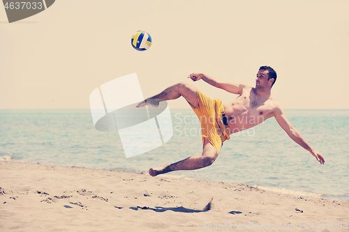 Image of male beach volleyball game player