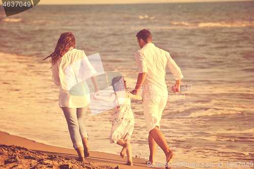 Image of happy young  family have fun on beach