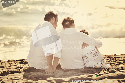 Image of happy young  family have fun on beach