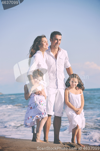 Image of happy young  family have fun on beach