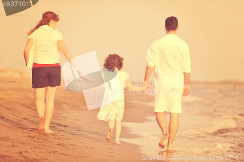 Image of happy young family have fun on beach