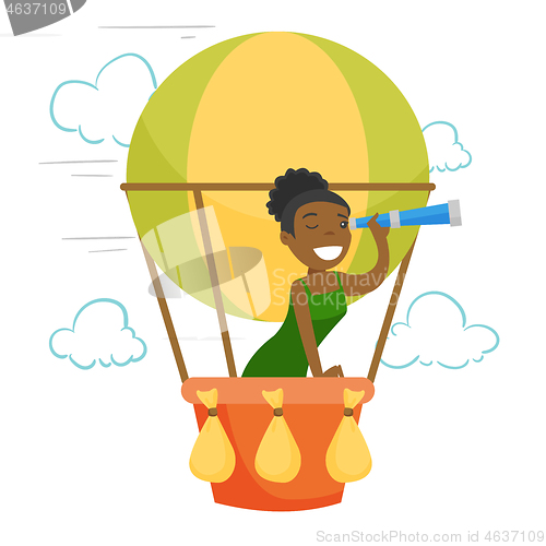 Image of African-american woman flying in hot air balloon.