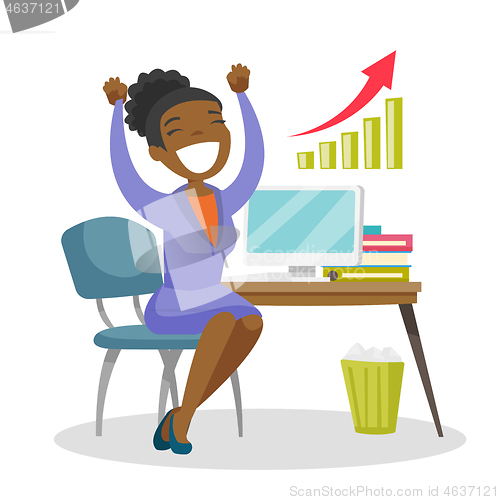 Image of Successful entrepreneur celebrating at workplace.