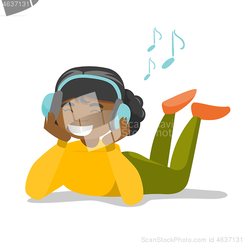 Image of Young woman in headphones listening to music.