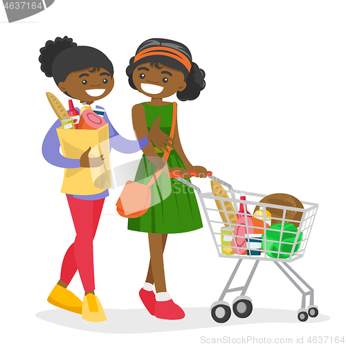 Image of African women doing shopping at the grocery shop.