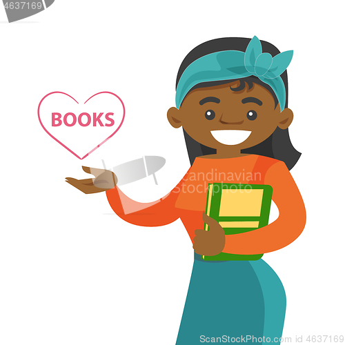 Image of Young african-american student holding a book.