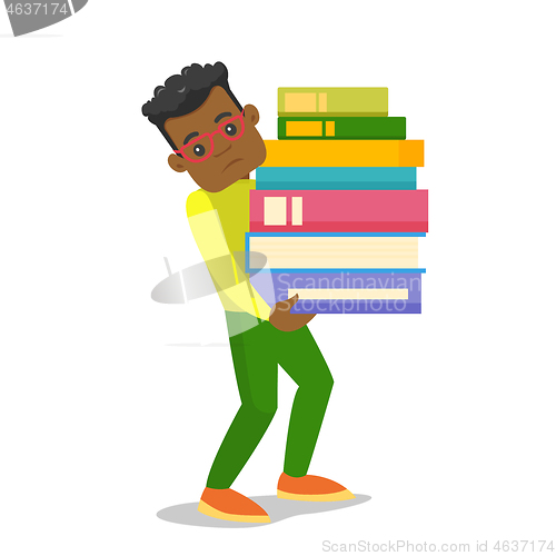 Image of College student carrying a heavy pile of books.