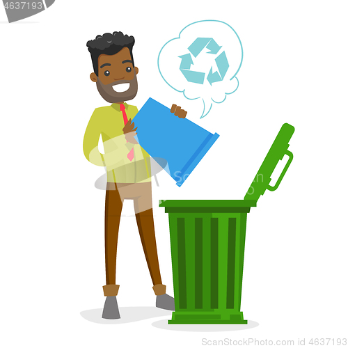 Image of Young african man with recycle bin and trash can.