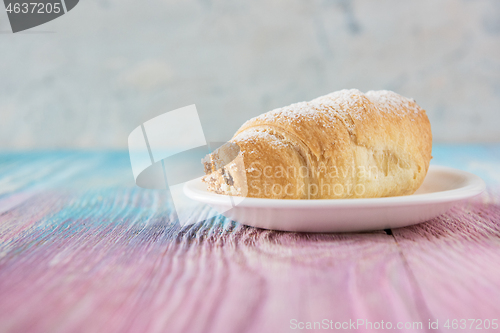 Image of Tasty eclair on plate