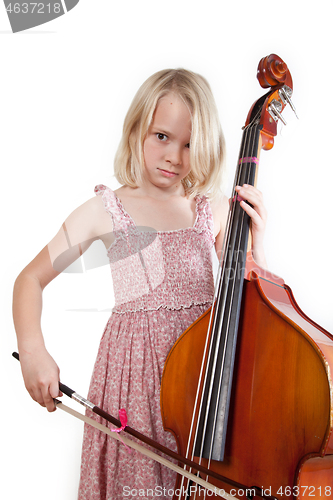 Image of Portrait of a young teenager girl in studio with a cello