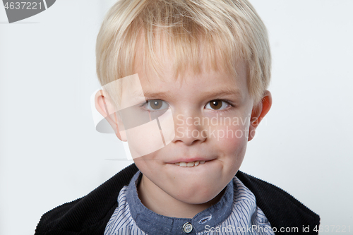 Image of Portrait of a scandinavian young boy in studio