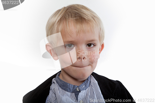 Image of Portrait of a scandinavian young boy in studio