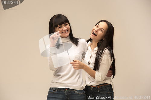 Image of A portrait of a happy mother and daughter