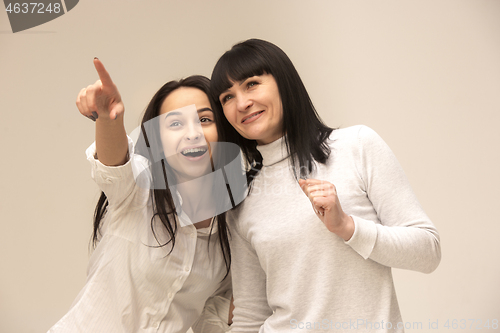 Image of A portrait of a happy mother and daughter