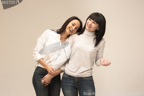 Image of A portrait of a happy mother and daughter