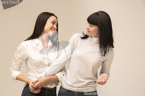 Image of A portrait of a happy mother and daughter