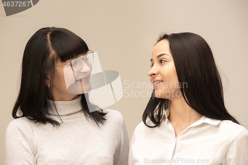 Image of A portrait of a happy mother and daughter