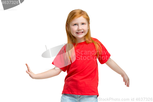 Image of Full length portrait of cute little kid in stylish jeans clothes looking at camera and smiling