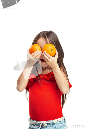 Image of Full length portrait of cute little kid in stylish jeans clothes with orange