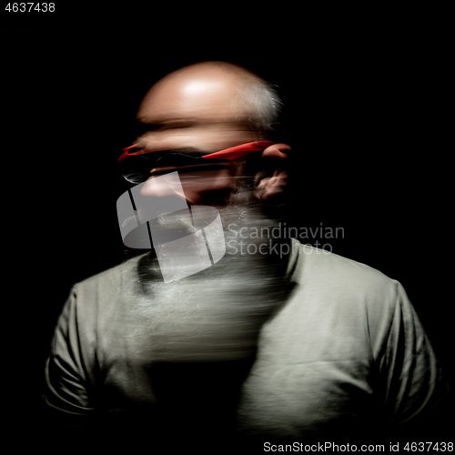 Image of bearded man motion blur portrait