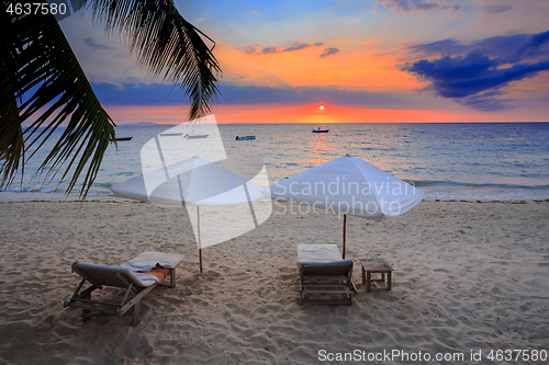 Image of Sunset over Madagascar Nosy be beach with sunlounger
