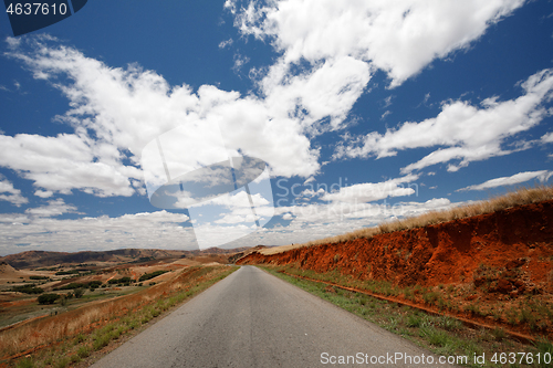 Image of Road through Madagascar highland countryside landscape.