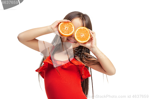 Image of Full length portrait of cute little kid in stylish jeans clothes with orange