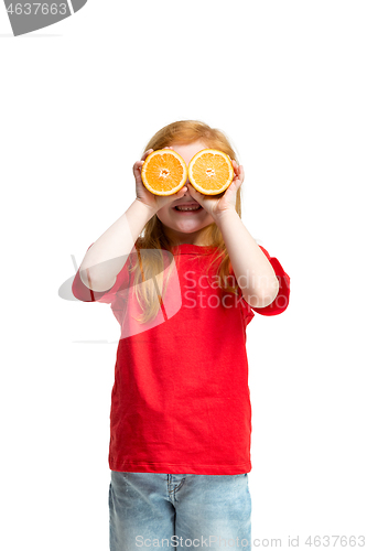 Image of Full length portrait of cute little kid in stylish jeans clothes with orange