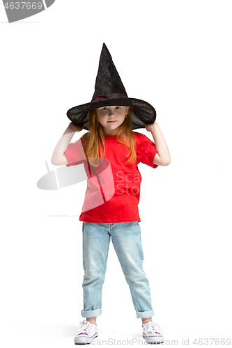 Image of Full length portrait of cute little kid in stylish jeans clothes looking at camera and smiling