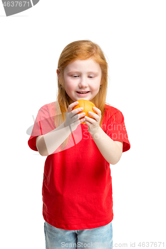 Image of Full length portrait of cute little kid in stylish jeans clothes with orange