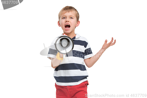 Image of Little cute kid baby boy holding in hand and speaking in electronic gray megaphone