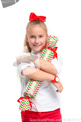 Image of Full length portrait of cute little kid in stylish clothes looking at camera and smiling