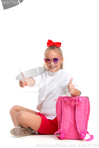 Image of Full length portrait of cute little kid in stylish sunglasses looking at camera and smiling