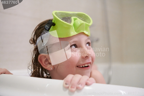 Image of little girl with snorkel goggles