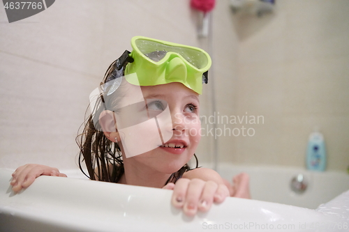 Image of little girl with snorkel goggles