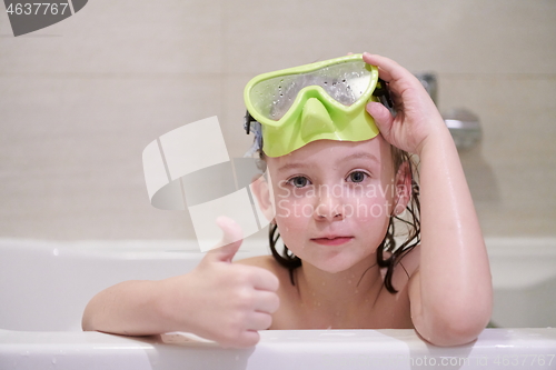 Image of little girl with snorkel goggles